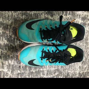 NIKE Womens sneakers in Turquoise with black details and neon yellow in sole
